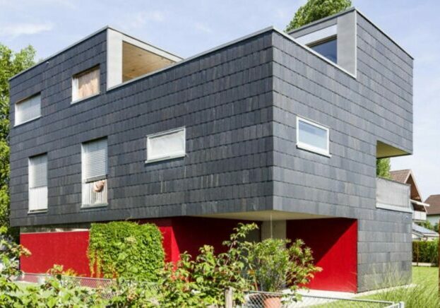 Ein 2-stöckiges Zuhause mit zeitlosen Fassadenbau- und Spenglerei Arbeiten